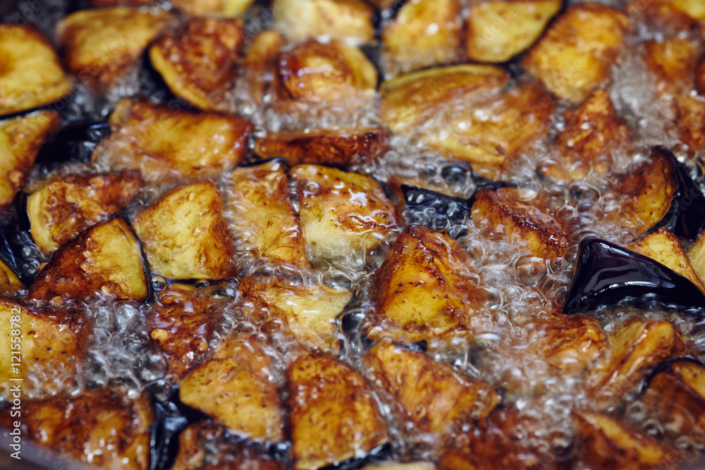 diced eggplant, frying in the oil
