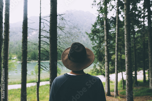 man seen from behind with b...