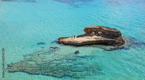 Small island in the blue sea