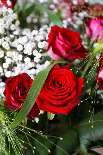 Bouquet of red roses and white flowers