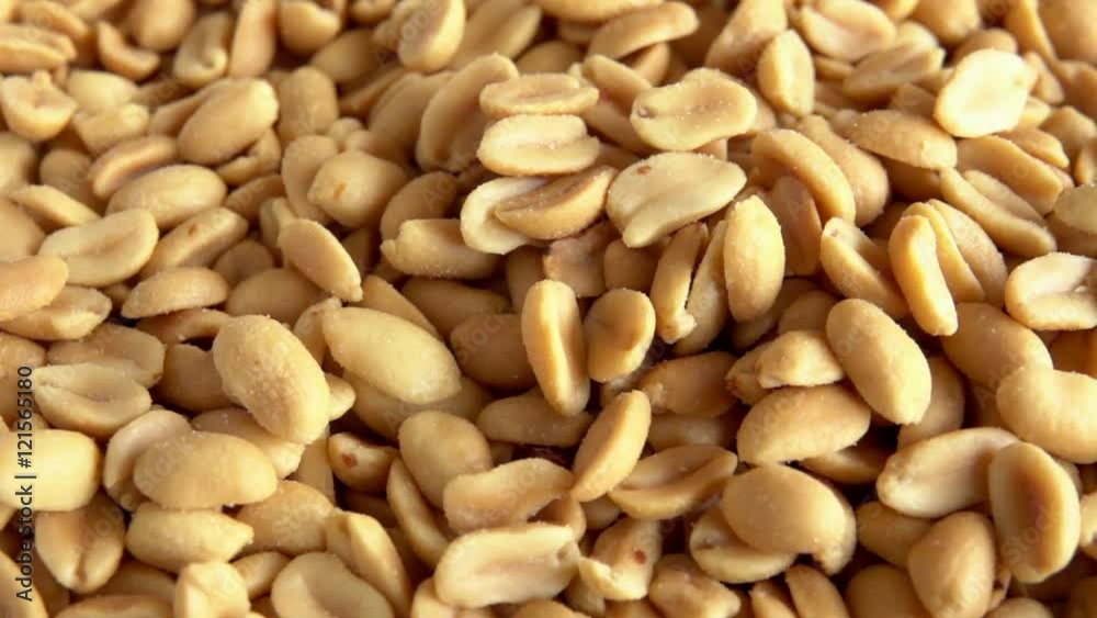 Salt peanuts falling in slow motion. Close up food film clip of snacks. Salt peanuts falling in slow motion. Close up food film clip of snacks.