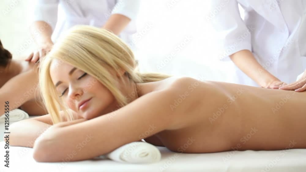 Beautiful women getting massage Stock Video | Adobe Stock