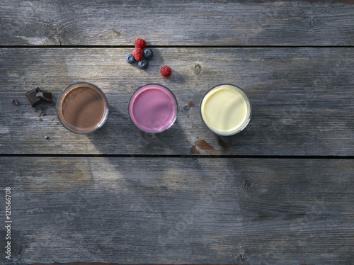 Berry beverages old wooden on a gray/blue background.