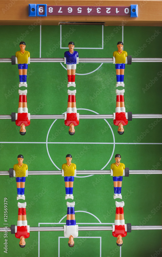 Fototapeta premium foosball table soccer . football players sport teame