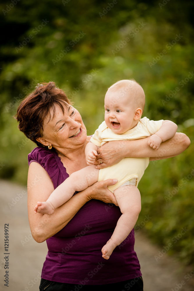 Fototapeta premium Grandmother with baby