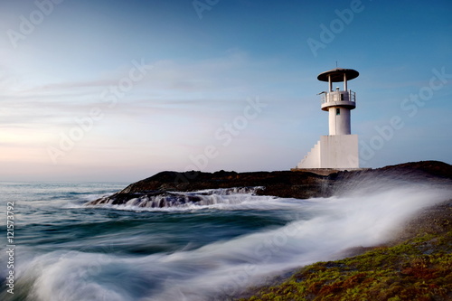 wave at light house in khaolak. © keng666