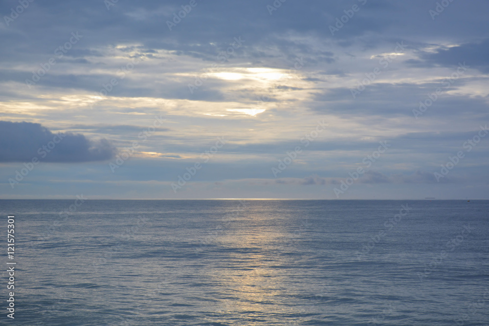 Sunrise Over the Calm Ocean