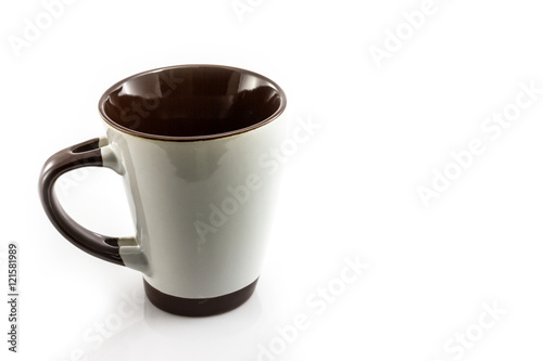 White and brown coffee cup on white