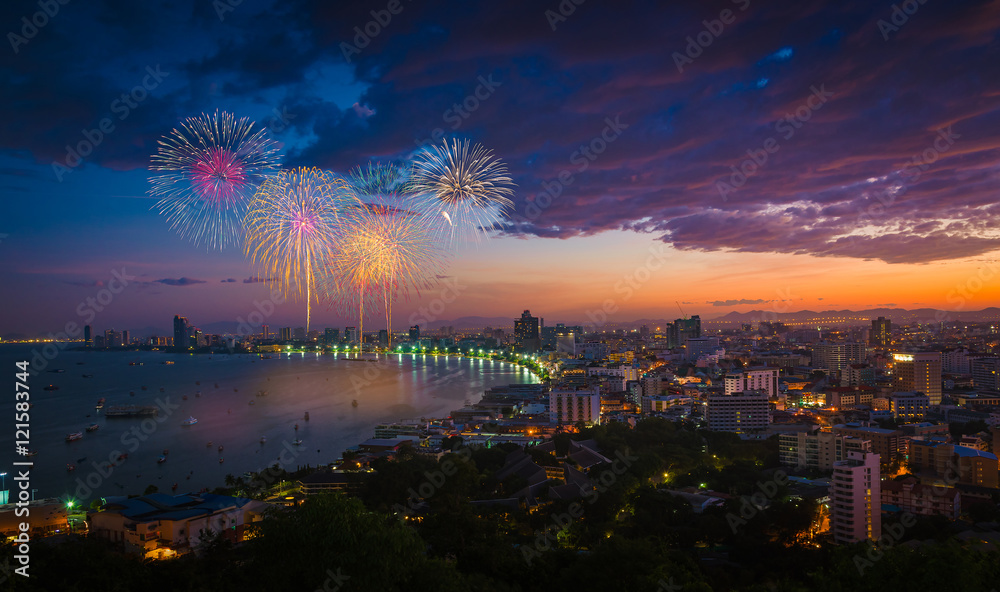 Multicolor fireworks night scene, blurred photo pattaya cityscap