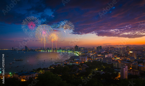 Multicolor fireworks night scene, blurred photo pattaya cityscap