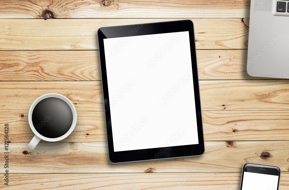 Tablet laptop coffee of cup and smartphone on wood table. Tablet laptop coffee of cup and smartphone on wood table.