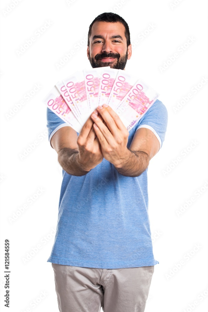 Man with blue shirt taking a lot of money Man with blue shirt taking a lot of money