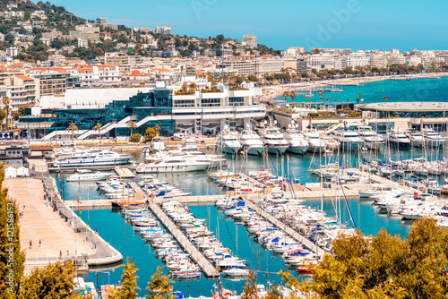 Fototapeta Naklejka Na Ścianę i Meble -  Top cityscape view on french riviera with yachts in Cannes city