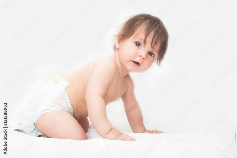Bright picture of crawling baby girl in diaper. Bright picture of crawling baby girl in diaper.