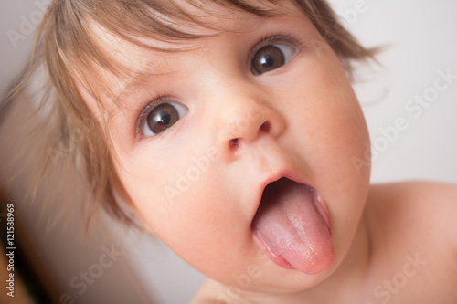 Cute baby showing tongue