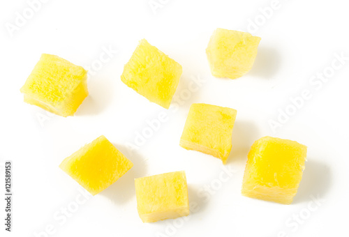 Mango slice cut to cubes isolated on white background