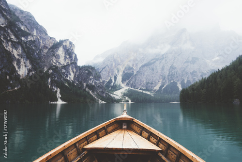 Wood boat in Braies lake