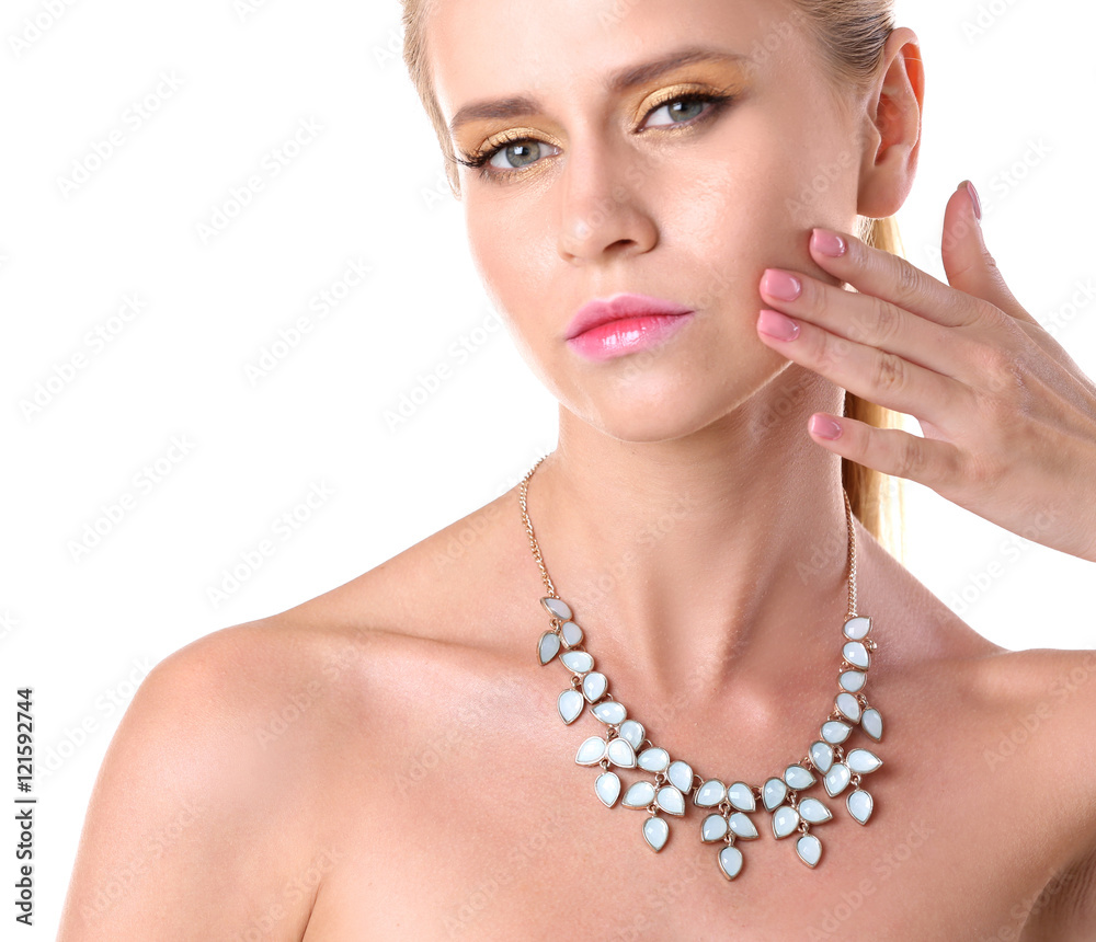 Portrait of attractive woman with beautiful necklace on her neck