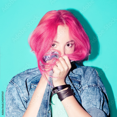 Pretty girl with pink hair. Vanilla color. Fashion mix. photo