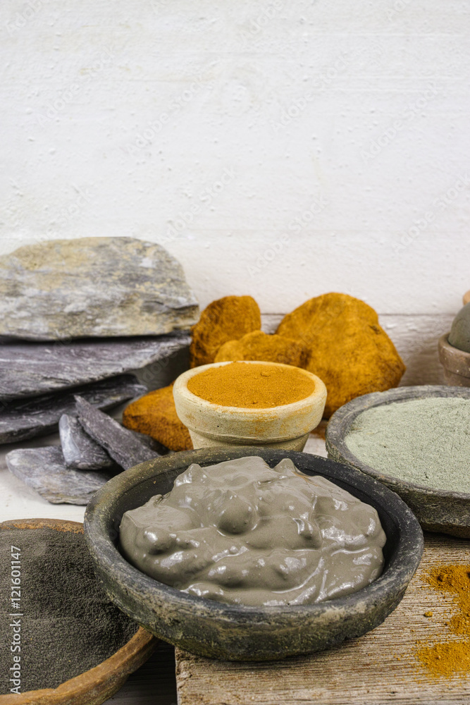 Ancient minerals - ochre, green  and blue clay powder and mud mask for spa and beauty