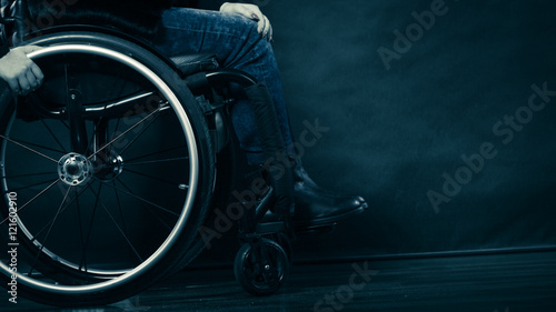 Woman invalid girl sitting on wheelchair