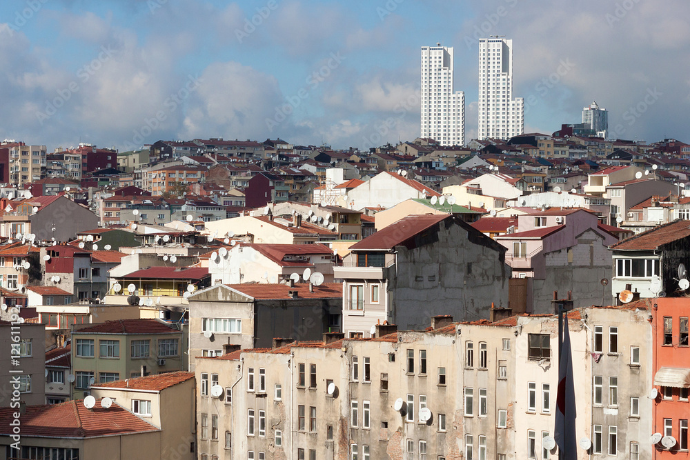 View of old houses and tiled roofs of Istanbul in the Beyoglu district. Next to the famous Taksim Square.