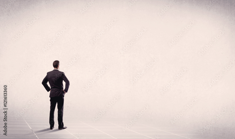 Business person standing in empty space Business person standing in empty space