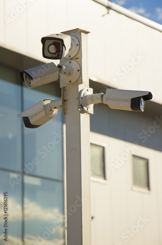 A post full of surveillance cameras
