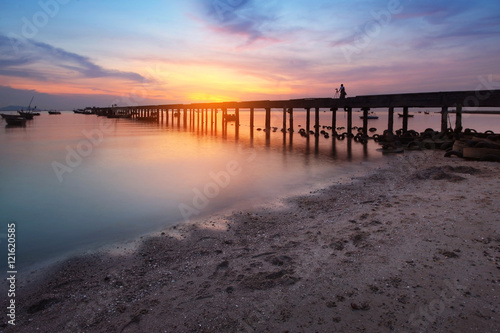 Silhouette natural background of jetty and colorful sky during time the sunset at BangPhra beach   Chonburi province in Thailand is a very popular for photographers and tourists