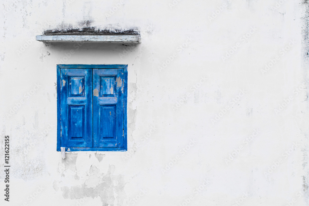 blue color windows on white wall with space for text. blue color windows on white wall with space for text.