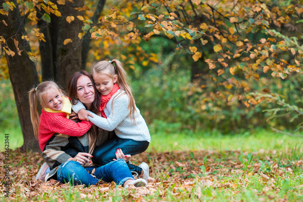 Fototapeta premium Happy family in autumn park outdoors