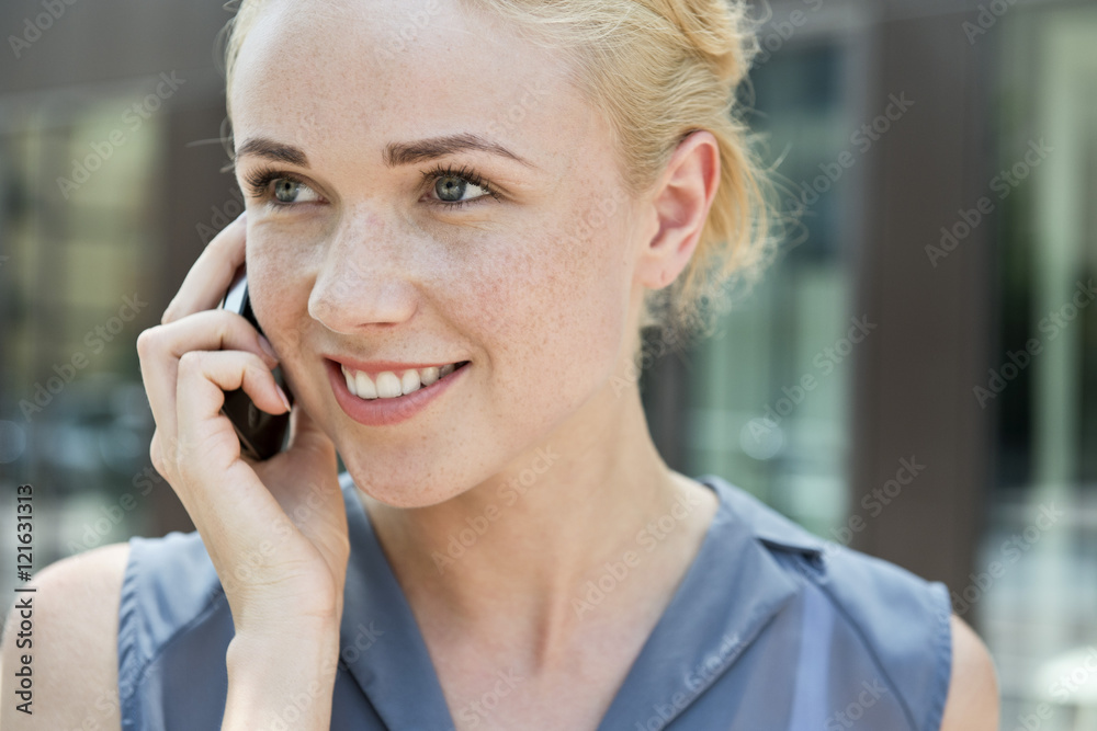 Young woman making phone call using smartphone Young woman making phone call using smartphone
