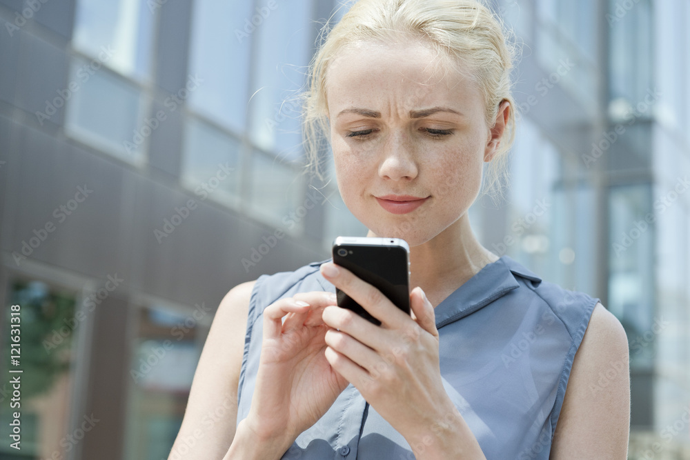 Young woman using smartphone Young woman using smartphone