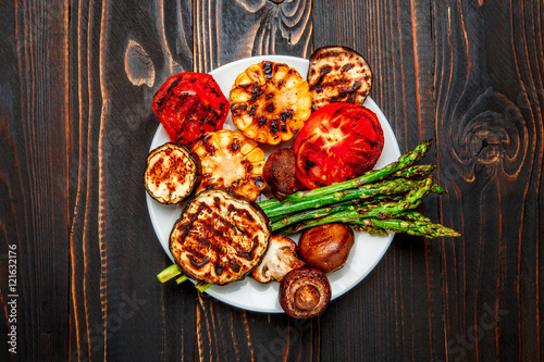 grilled vegetables on wooden table