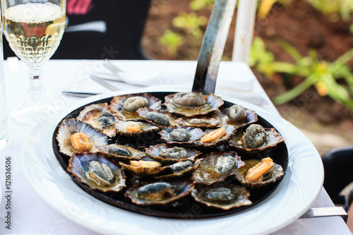 Traditional Madeira dishes-limpet (lapas), Madeira, Portugal  