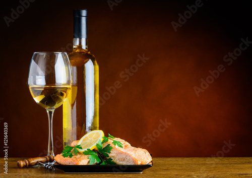 Fototapeta Naklejka Na Ścianę i Meble -  White Wine and Cooked Fish with Copy Space
