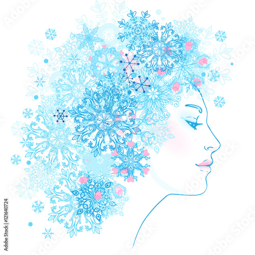 Fantasy Snow Queen: young beautiful girl with blue snowflakes in