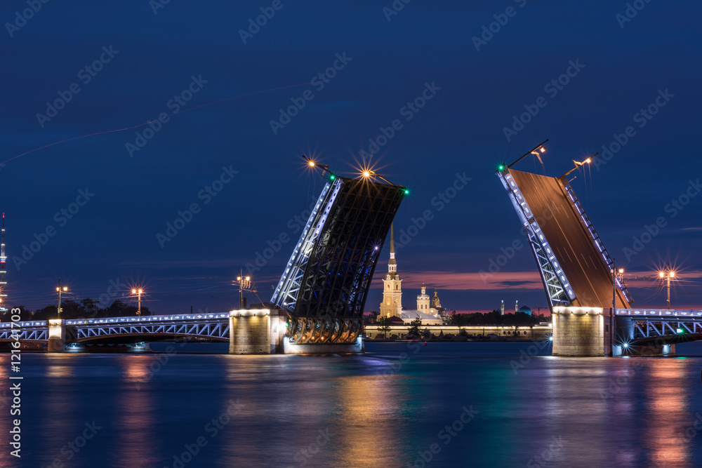 White nights. View of Neva river and raised Palace Bridge in St.
