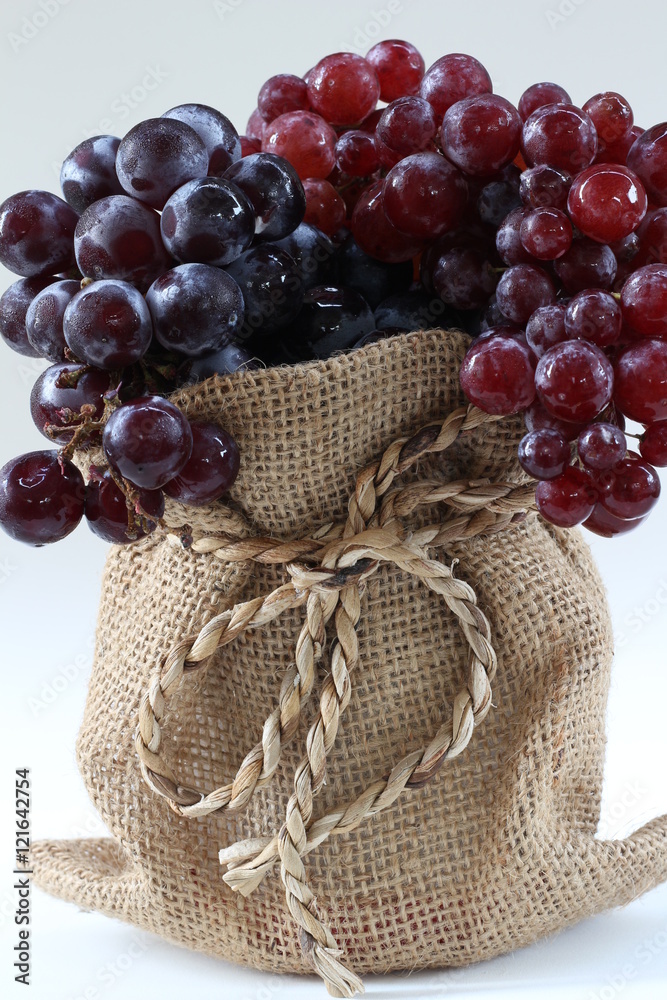 grape fruit berry in bag on white background grape fruit berry in bag on white background