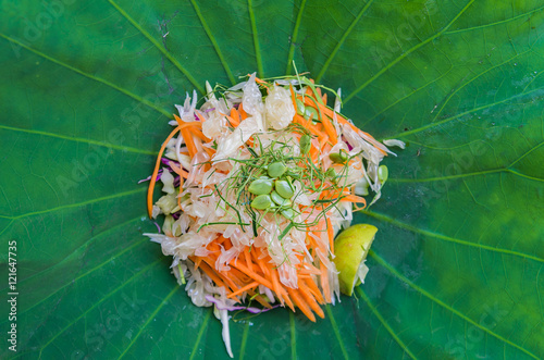 Thai Southern Rice Salad with Herb Vegetables on Lotus leaf with selective focus
