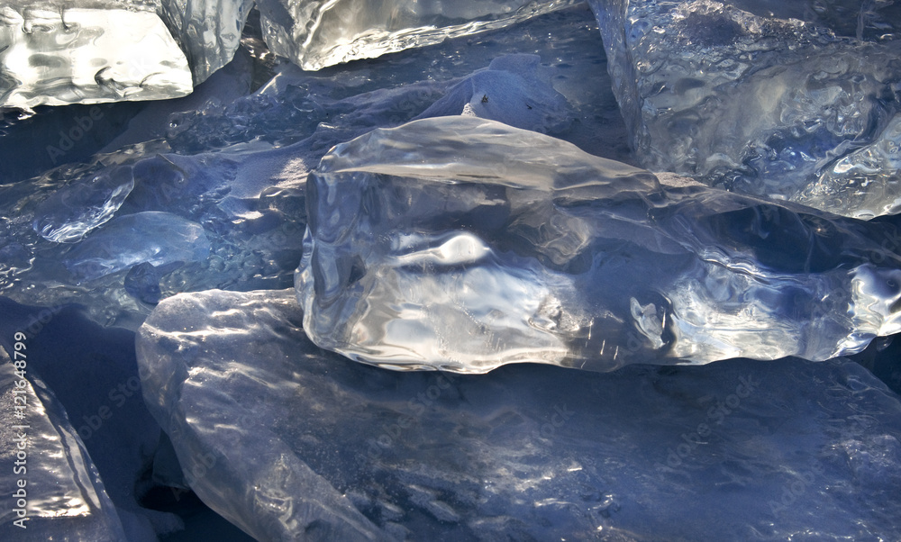 Winter. Extremal cracks on Ice of Lake Baikal. thickness of about one meter. . Ice storm. the crystal clear frozen water. Used toning of the photo. 