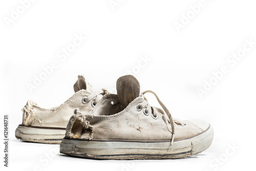 old sneakers isolated on white