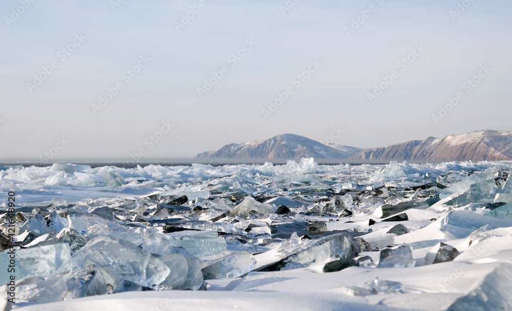 Winter. Extremal cracks on Ice of Lake Baikal. thickness of about one meter. . Ice storm. the crystal clear frozen water. Used toning of the photo. 