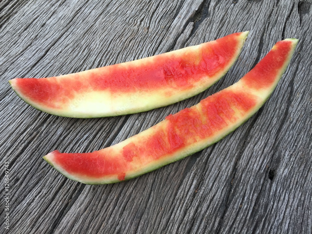 watermelon rind on wood background watermelon rind on wood background
