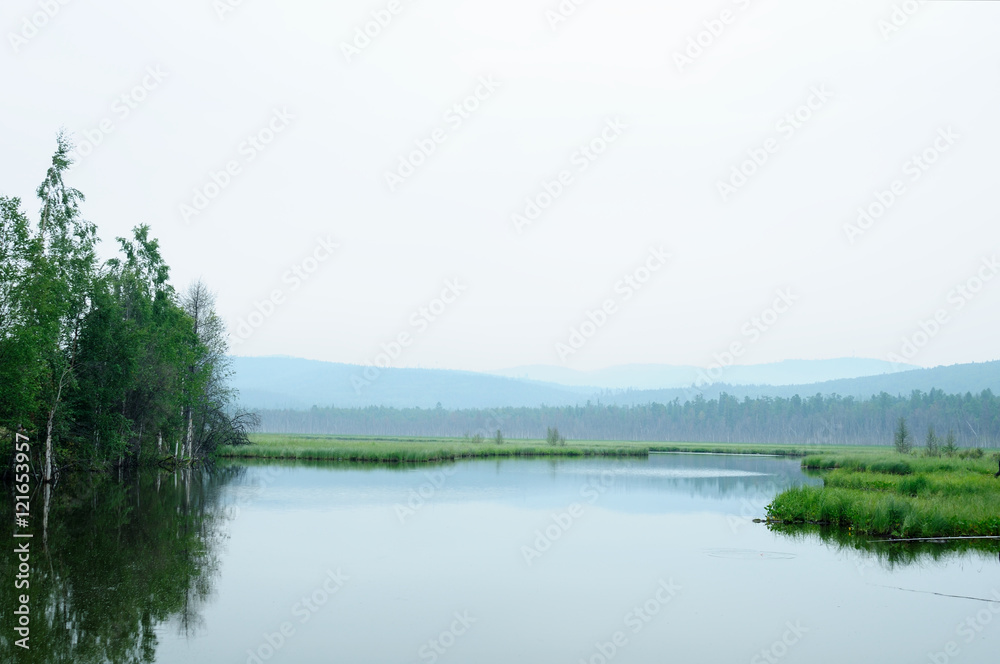 early misty morning  on a lake