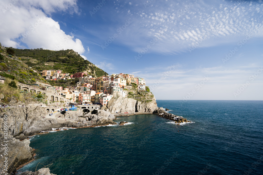View of manarola village small town in Cinque terre situated is valley of La Spezia , Italy
