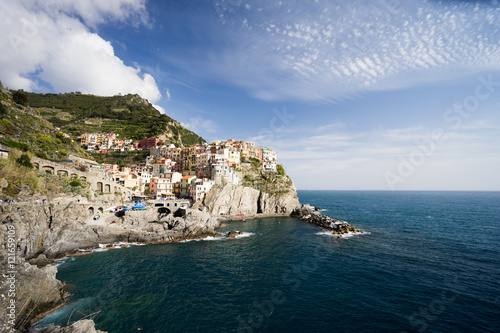 View of manarola village small town in Cinque terre situated is valley of La Spezia , Italy