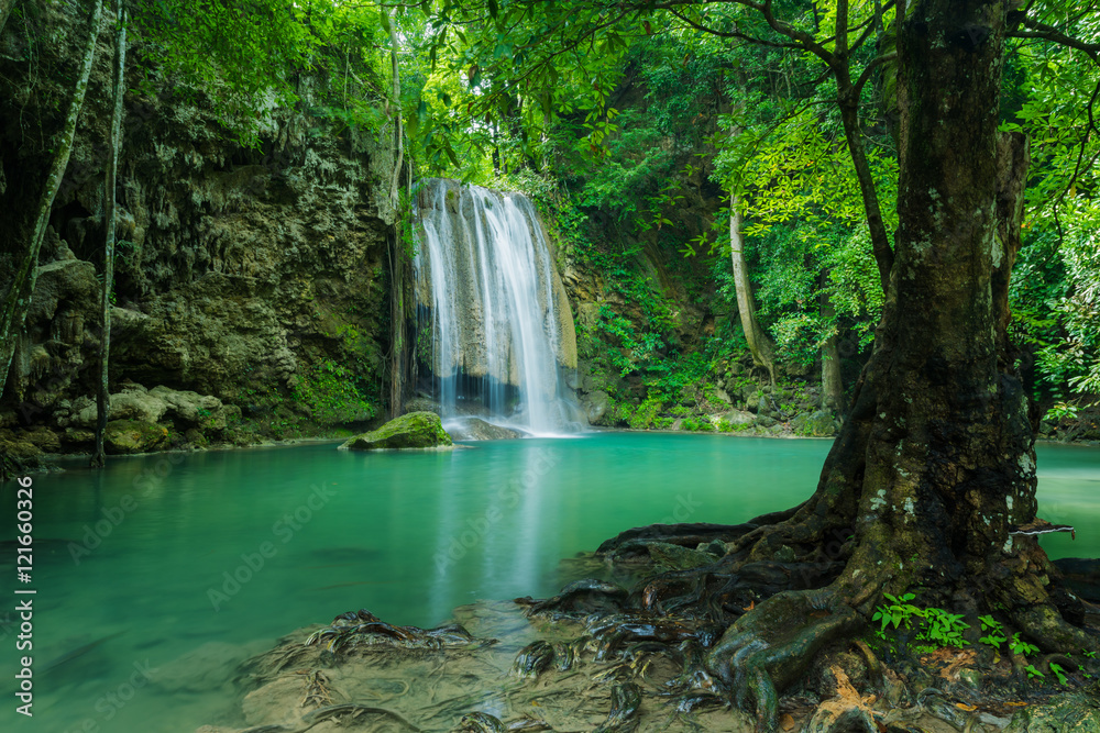 Fototapeta premium Green nature with green waterfall , Erawan waterfall , Loacated Kanjanaburi Province , Thailand