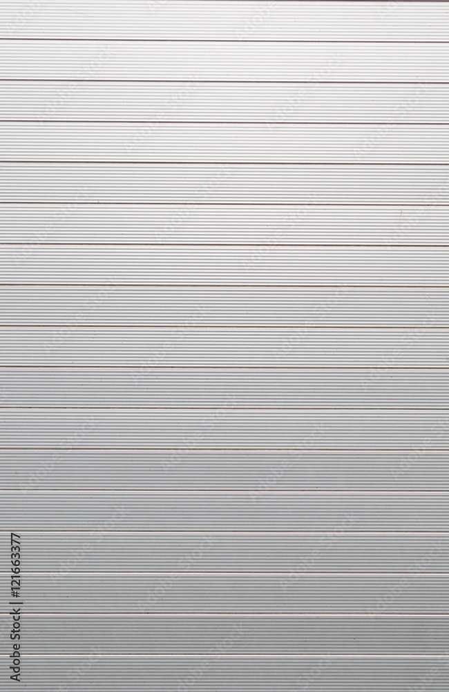 metal texture, shiny aluminum background with linear relief part