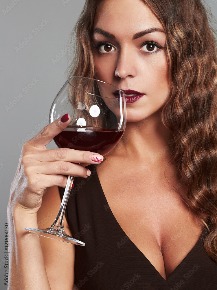 gorgeous sexy girl with glass of red wine.Beautiful woman drinking  wine.make-up Stock Photo | Adobe Stock